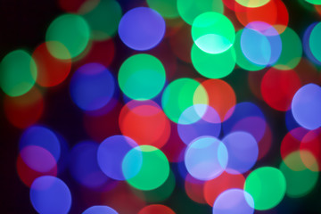 Multicolor bokeh of LED light on dark background