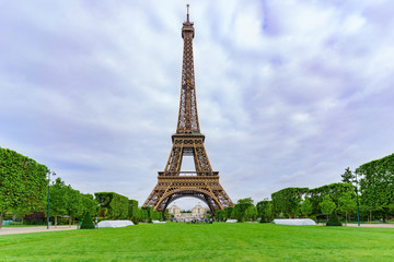 Fototapeta premium The famous Eiffel Tower in the cloudy day , Paris , France