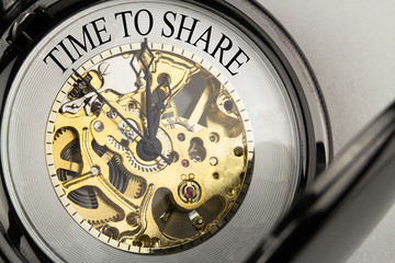 Time to Share auf Taschenuhr