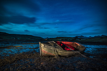 Fototapeta na wymiar Lonely boat at night