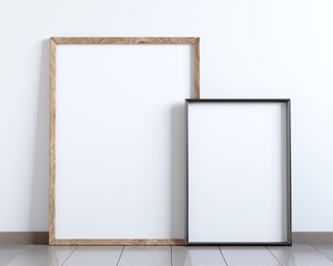 Mockup of two blank frame posters on the floor, 3D rendering