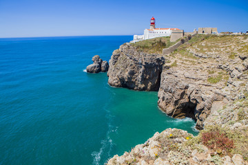 Lighthouse at Cabo de Sao Vicente, Algarve, Portugal. The lighthouse is situated on the tip of the...