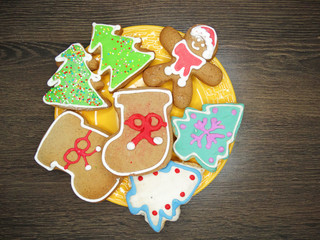 christmas cookies gingerbread and decoration on wooden background