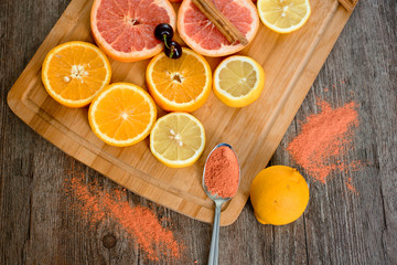 Citrus fruit background with sliced oranges as a symbol of healthy nutrition