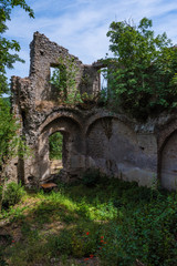 Fototapeta premium Monterano (also known as Ancient Monterano) is a ghost town in Italy , located in the province of Rome, perched on the summit plateau of the hill tuff.