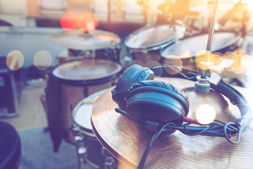 Drum set detail.Drum and headphones on stage.Musical instrument