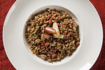 pinion paçoca in the white plate