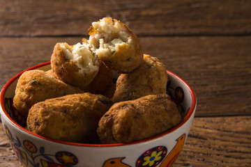 Cod fritters, traditional Spanish tapas Bunuelos de Bacalao