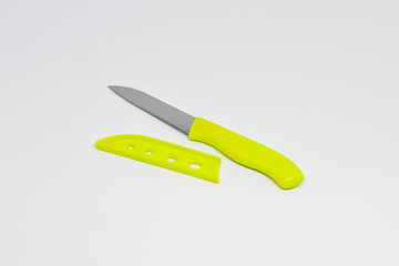 Yellow Kitchen knife on the white background