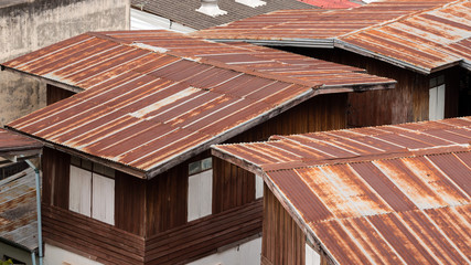 Obraz na płótnie Canvas The roof of a house in Thailand,roof is made of tin or tile.