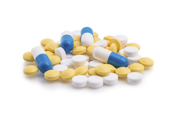 Pills on white background