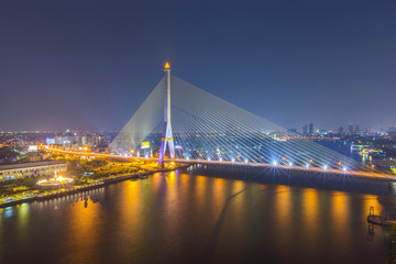 Obraz premium The Rama VIII Bridge is a cable-stayed bridge crossing the Chao Phraya River in Bangkok, Thailand.