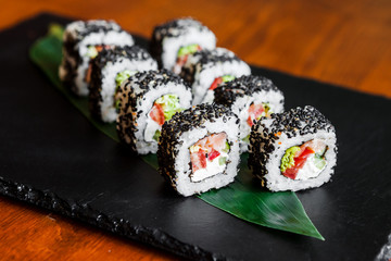 Delicious rolls with fish and cheese