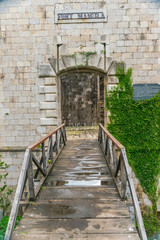 Fototapeta na wymiar Entrance to the military fortress of Mamula. Montenegro, Boka-Kotor Bay.