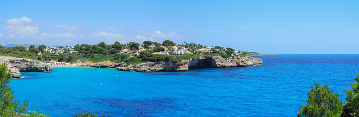 Fototapeta na wymiar Landscape of the beautiful bay of Cala Mandia with a wonderful turquoise sea, Porto Cristo, Majorca, Spain 