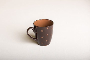Empty cup of coffee on white background