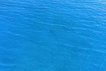 Obraz premium Natural background of blue sea water.