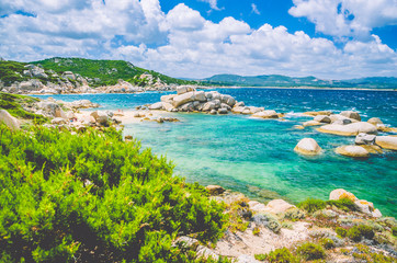 Costline of Costa Serena with sandstone rocks in sea, Sardinia, Italy