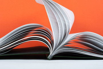 Naklejka premium Macro view of book pages. Concept passion and fire, sail.