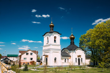Fototapeta na wymiar Zheleznyaki, Vetka District, Gomel Region, Belarus. Belfry And C