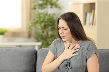 Woman suffering respiration problems