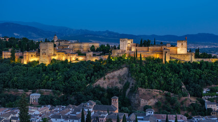 Fototapeta na wymiar Ancient arabic fortress of Alhambra at sunset. Granada, Spain.