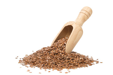 Raw, unprocessed linseed or flax seed in wooden scoop - obrazy, fototapety, plakaty