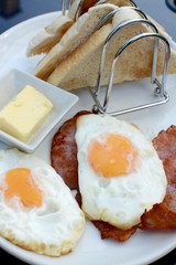 English breakfast with fried eggs, bacon and toast 