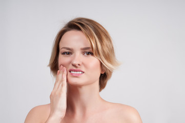 Closeup of woman suffering from toothache