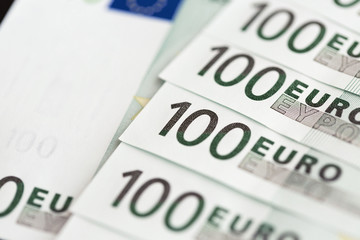 Close-up of 100 Euro banknotes. Shallow dof