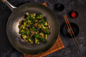 Cooking asian wok with stir fry vegetables