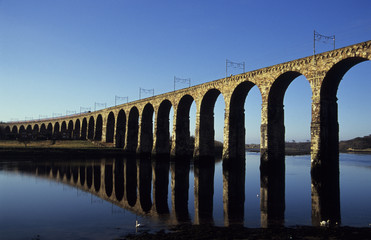 GNER intercity train crossing the Royal Border Railway viaduct built by Robert Stevenson at...