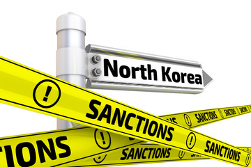 Sanctions against North Korea. Concept. Street sign with the word "North Korea" and yellow warning tapes with the word "SANCTIONS"