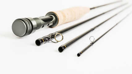 A fly fishing rod on a white background.