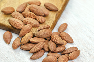Almonds on a wooden background