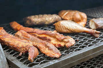 Smoked turkey and chicken outdoors, street food