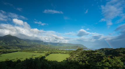 View of Hanalei after storm with rainbow