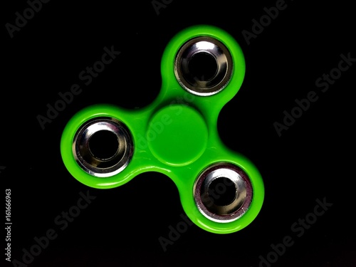 a green fidget spinner