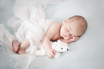 Two weeks old baby to sleep with teddy bear