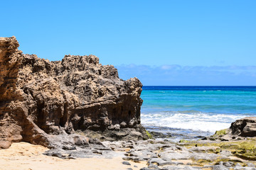Fototapeta na wymiar Seascape of the beach at Ponta da Calheta, Porto Santo Island, Portugal