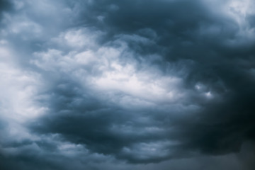 Fototapeta na wymiar Dramatic black clouds and thunderstorm before rainy