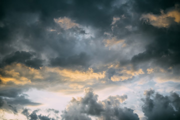 Fototapeta na wymiar Sunset with dramatic storm clouds