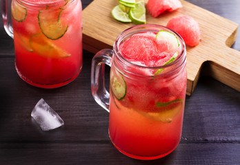 Watermelon, cucumber and lime cocktail in jars