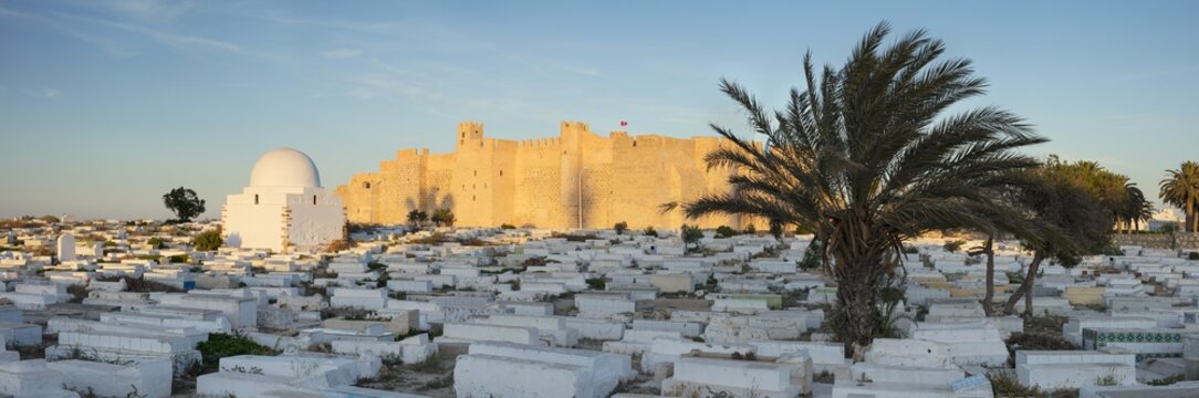 old fort in sun lights with cemetery in Tunisia