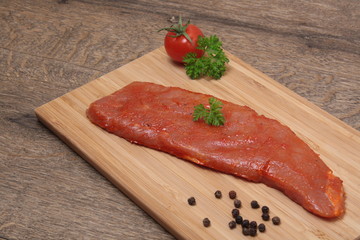 Pork neck slices on a plate