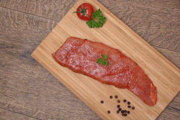 Pork neck slices on a plate