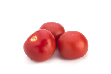 Red tomatoes on a white background