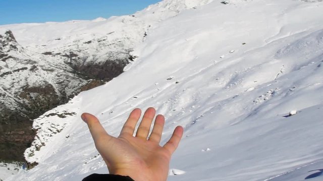 Hand Expressing Positivity on the Top of the Mountain