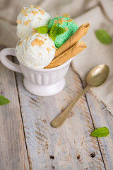 Vanilla and mint ice cream in cup