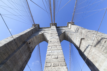 Brooklyn Bridge: brick tower arch viewed from bridge